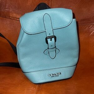 Coach mini backpack/crossbody, light blue leather, black adjustable fabric strap